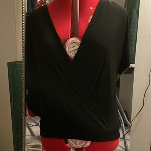 Black summer V in front and back ties in the back at the nap of your neck